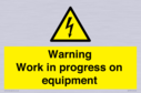 warning-work-in-progress-on-equipmentwith-electrical-hazard-symbol~